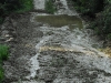 The dip fills with mud from the fields